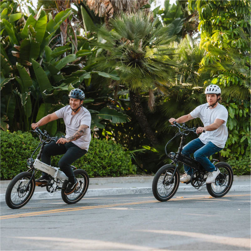 Two men are riding lectric ebikes in Alabama. 